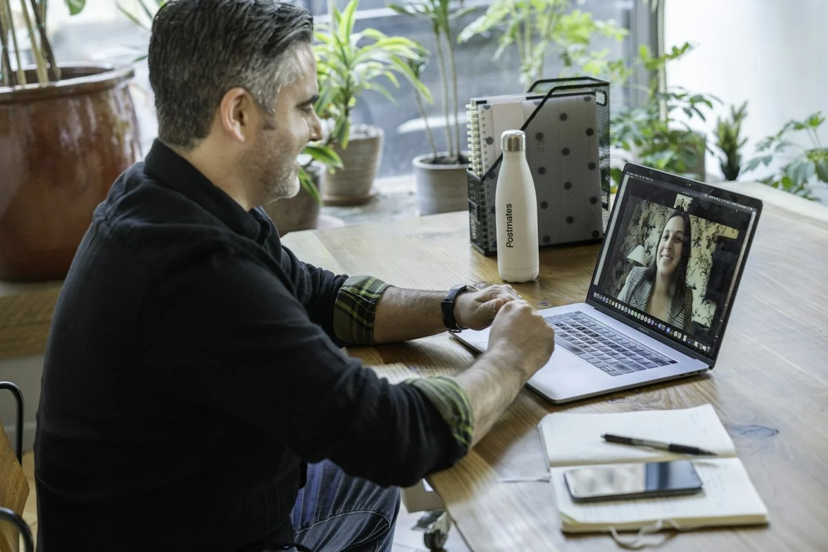 Developer on a video call with a client
